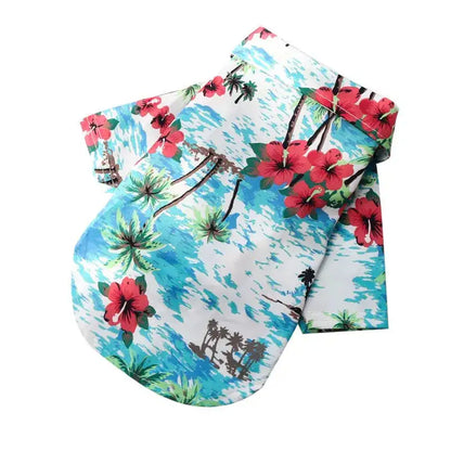 Camisa hawaiana para perro celeste con flores rojas